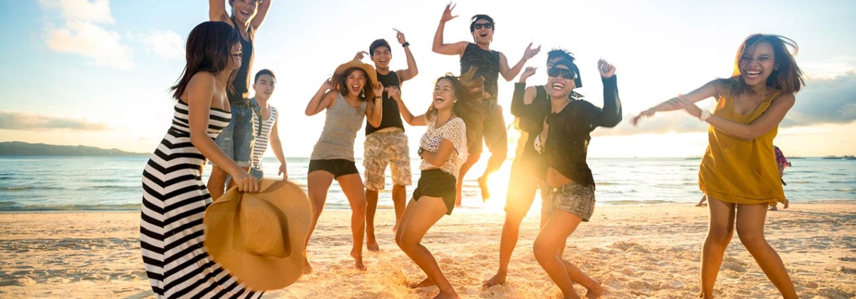 Happy young people on beach